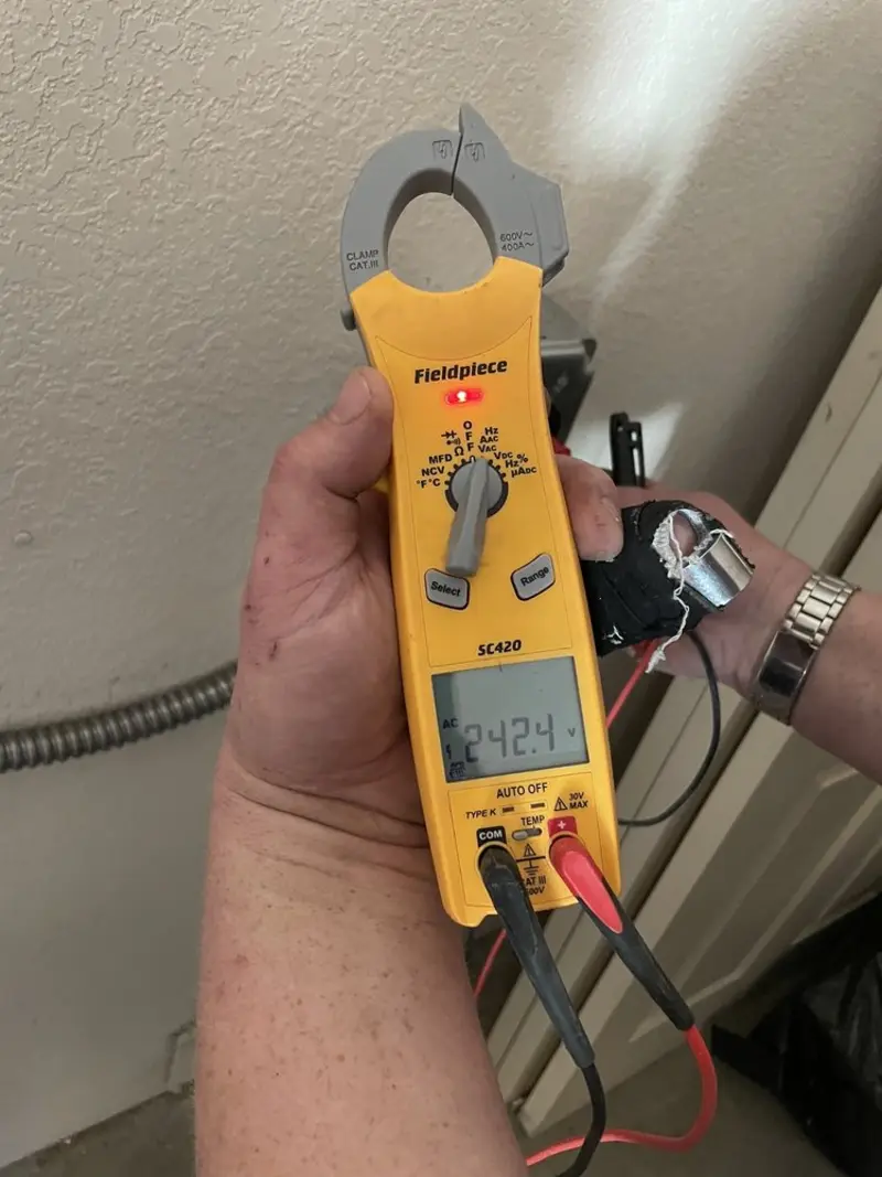 Voltage testing with clamp meter during Hot Tub / Pool Electrical Wiring in Schuyler Falls